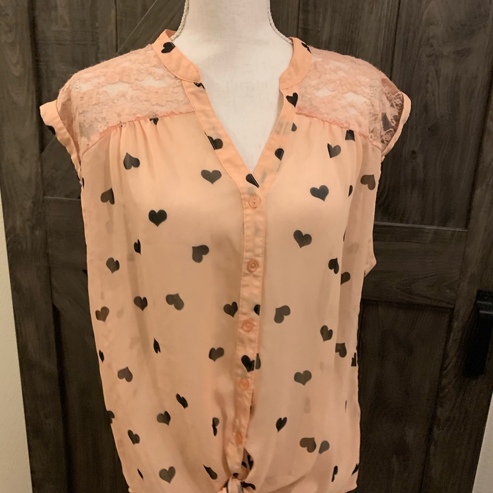 Sheer sleeveless blouse from front tie‎